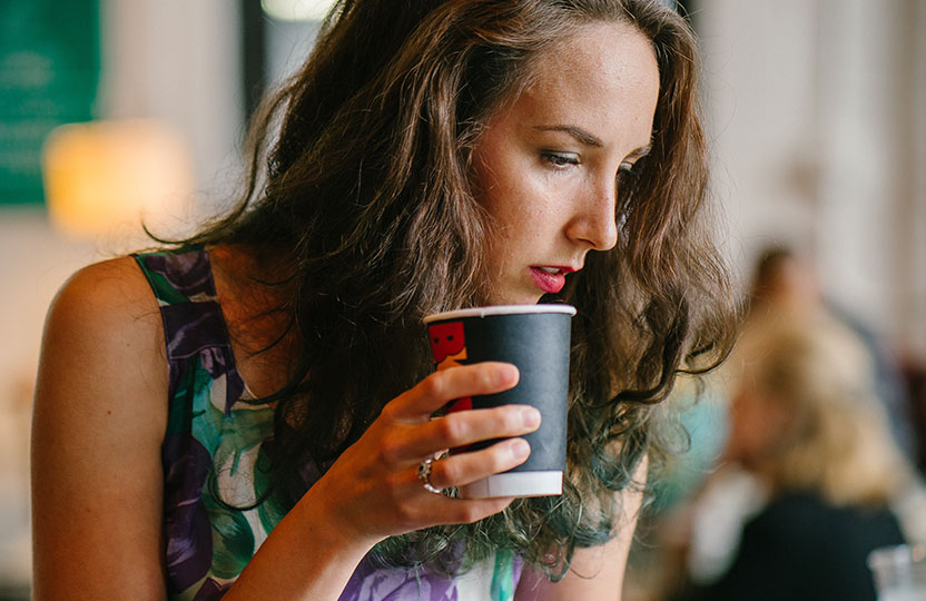 Woman drinking coffee staff-3